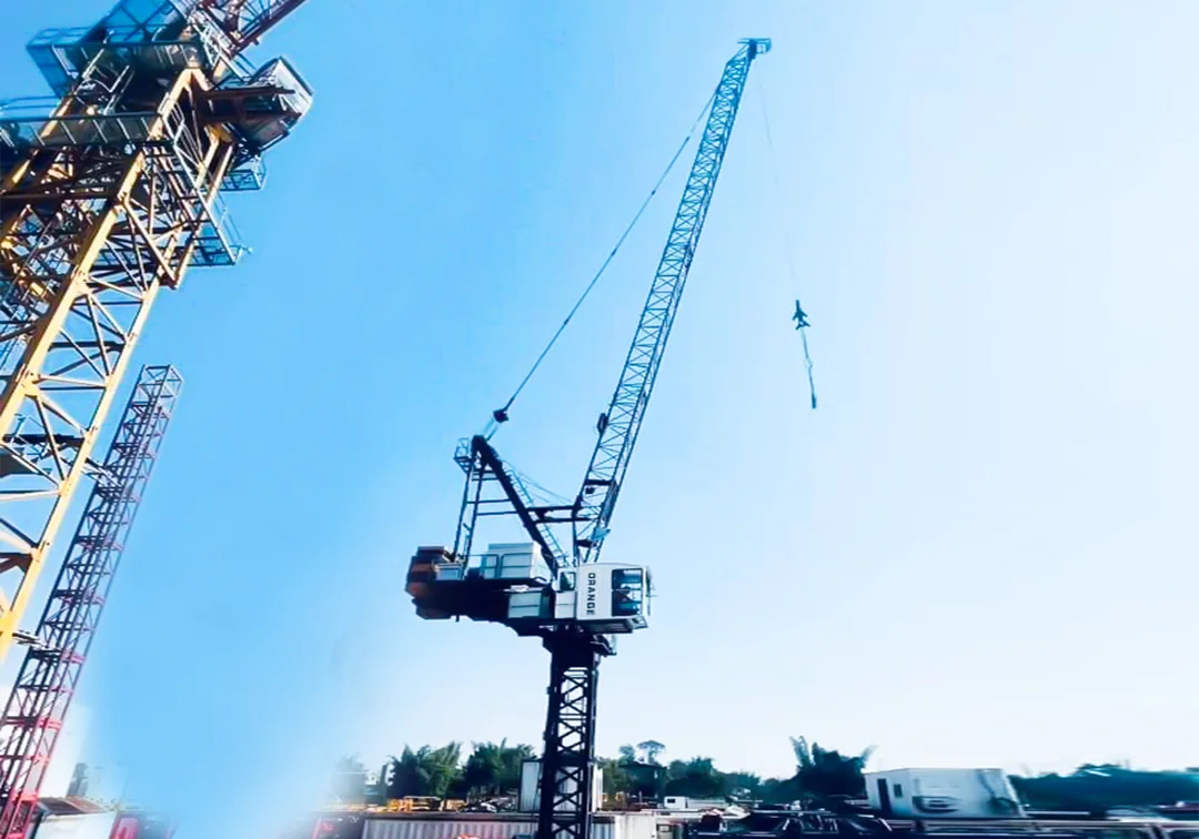 Luffing crane at construction area